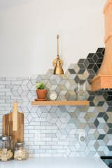 Kitchen, Engineered Quartz, Ceramic Tile, Wall, and Mosaic Tile Floating Shelves + Statement Backsplash   Kitchen Engineered Quartz Mosaic Tile Photos from construction2style Home