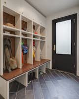 Hallway and Light Hardwood Floor Dorchester Interior Mudroom/Lockers  Photo 4 of 16 in Entry by Keith Stoneman from The Dorchester Project by  Paul + Jo Studio