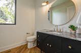 Bath Room, Light Hardwood Floor, Undermount Sink, Recessed Lighting, One Piece Toilet, and Wall Lighting Dorchester Interior Powder Room  Photo 19 of 40 in The Dorchester Project by  Paul + Jo Studio by Barbara Koch
