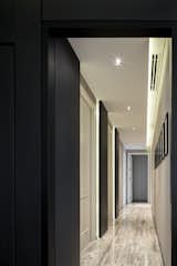 Hallway and Travertine Floor The Gallery leads to Bedrooms.   Photo 8 of 14 in The Ritz-Carlton Residences @Mahanakorn Building by Pitch Nimchinda