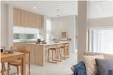 Kitchen, Marble Counter, Recessed Lighting, Drop In Sink, Laminate Cabinet, and Porcelain Tile Floor How to take nature benefit when we’re living inside  Photo 12 of 20 in Khun Kwin's Residence by Pitch Nimchinda