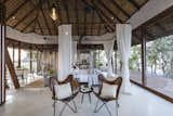 Living Room, Ceiling Lighting, Cement Tile Floor, and Chair Upper Level View overlooking the living room  Photo 2 of 14 in Tala Treesort by Architecture BRIO