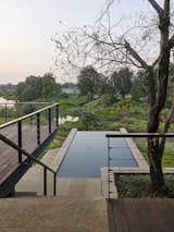 Infinity Swimming pool overlooking a river
