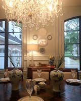 Dining Room, Medium Hardwood Floor, Chair, Table, Ceiling Lighting, and Lamps I'm a sucker for a Dining room dripping with traditional details!  Photo 2 of 3 in Detailed by Design by Brittany Wallace