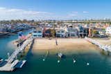 A bayfront Newport Beach property listed by Coldwell Banker Residential Brokerage for $6,295,000.