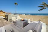 An oceanfront Newport Beach property listed by Coldwell Banker Residential Brokerage for $11,495,000.