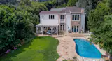 The Beverly Hills property of American film producer and co-founder of Orion Pictures Mike Medavoy and philanthropist Irena Medavoy listed by Coldwell Banker Residential Brokerage for $5,495,000. 
