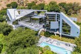 Malibu Glass House by Edward Niles Architects sold by Coldwell Banker Residential Brokerage for $4,200,000.   Photo 1 of 8 in 21757 Castlewood Dr by Miguel Covarrubias