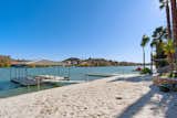 A lakefront Canyon Lake property listed by Coldwell Banker Realty for $1,400,000. 