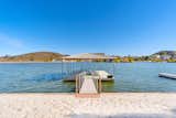 A lakefront Canyon Lake property listed by Coldwell Banker Realty for $1,400,000. 