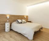 Bedroom, Bed, Wall Lighting, Ceiling Lighting, and Night Stands  Photo 5 of 9 in Sant Cugat, Catalunya, Spain by Marina Sezam