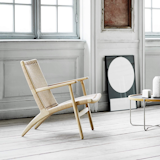 Designed in 1950, the CH25 Lounge Chair was one of the first four chairs Hans J. Wegner created especially for Carl Hansen & søn within his first three weeks with the company.