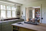 Kitchen, Microwave, Recessed Lighting, Refrigerator, Range, Wall Oven, Colorful Cabinet, Dishwasher, Drop In Sink, and Light Hardwood Floor Custom kitchen island and storage fronts bring a uniqueness and functionality to this aesthetically pleasing space.  Photo 2 of 20 in Modern Farmhouse by Hygge Stay