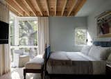 Bedroom, Chair, Bed, Light Hardwood Floor, and Bench  Photo 15 of 27 in Belmont Park by Cuppett Kilpatrick Architecture + Interior Design