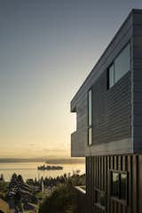 Exterior, Concrete Siding Material, Wood Siding Material, Prefab Building Type, House Building Type, Tile Roof Material, Flat RoofLine, and Metal Siding Material The upper volume reaches for the infinite view.  Photos from Farwell