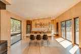 The simple kitchen backdrops the main living space.
