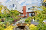 Numerous spaces are created using landscape elements while making spatial connections to the house.