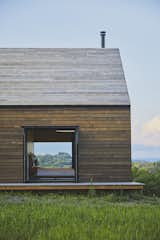 Exterior, Barn Building Type, Wood Siding Material, Green Siding Material, House Building Type, and Gable RoofLine The home pays homage to the area's rural character, rich heritage, and building typology.  Photos from Mountain House