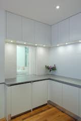 The glass can be transformed from clear to frosted with a switch providing privacy inside the bathroom.