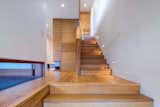 Staircase, Wood Railing, and Wood Tread  Photo 7 of 10 in New Farm House by Vibe Design Group
