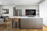 the kitchen was placed directly across from the front door