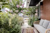 eastern-facing balcony became an outdoor kitchen and dining area