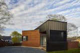Exterior, Wood Siding Material, Metal Roof Material, Flat RoofLine, Metal Siding Material, and House Building Type  Photo 4 of 8 in FERNBRAE BARN by RHAD Architects