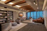 Living Room, Coffee Tables, Porcelain Tile Floor, Console Tables, Wall Lighting, Bookcase, Accent Lighting, Track Lighting, Sofa, Chair, Bench, Ottomans, Ceiling Lighting, Recessed Lighting, End Tables, and Sectional  Photo 3 of 15 in GROVENOR HOUSE by RS3 DESIGNS