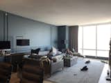 We sold everything in the home and replaced it with brand new white furniture (see the next image)  Photo 1 of 3 in Millennium Tower by Juan Carlos Consulting, LLC