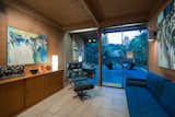 Living Room, Console Tables, Chair, Table Lighting, Ceramic Tile Floor, Sofa, and Track Lighting  Photo 17 of 54 in Robin Gay McCline residence by Nader Assemi