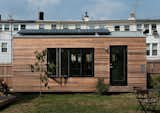 Minim Homes are wrapped in cyprus that gently ages to a gray shade. A 960-watt solar array on the roof can be battery-powered, which allows the homes—made in Washington, DC—to be completely off-grid.