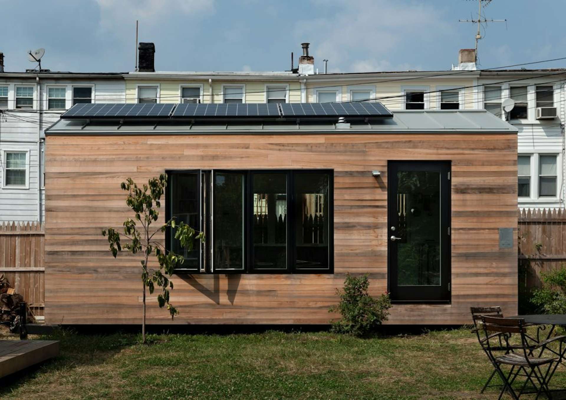 Minim Homes are wrapped in cyprus that gently ages to a gray shade. A 960-watt solar array on the roof can be battery-powered, which allows the homes—made in Washington, DC—to be completely off-grid.  