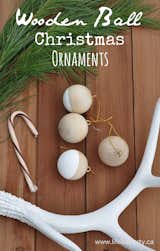 These modern Christmas ornaments, crafted in light wood and dipped in white, would pair perfectly with the modern garland shown above. Or, create a stunning display by hanging them from a black Christmas tree for a dramatic aesthetic.&nbsp;