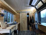 Kitchen, Medium Hardwood Floor, Range, Drop In Sink, Wood Cabinet, Wood Counter, and Track Lighting  Christin Perry’s Saves from Cabinscape
