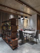 The wooden partition adds character to an area & its functional design ensures that it will provide luxurious backdrop for this home.