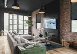 The great room features high ceilings with antique black pendant lights and natural raw wood. Plenty of sunlight shines through the grand bifold doors that open to the wrap around patio.