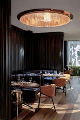 The hotel's restaurant, Mr. Porter, is a contemporary steakhouse with padded leather banquettes and immense copper-rimmed skylights.