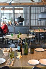 Fotografiska's restaurant serves a plant-based menu in a cozy, industrial-chic setting.