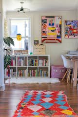 A vivid Moroccan rug leads to Finlayson's home office and studio.