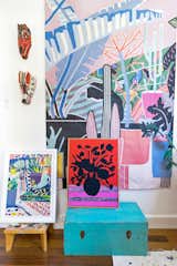 An array of Finlayson's past paintings and textiles adorns her studio.