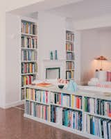 Built-in shelving provides plenty of room for the couple’s collection of books.