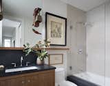 The vocabulary of cherry and infusion of light is evident in the upstairs bathroom.