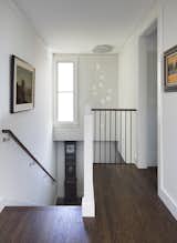Formally dark and cramped, Andrew Mann illuminated the center of the house by maximizing windows.  