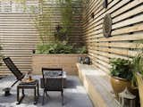 The terraced garden outside the bedroom extends the interior space. 