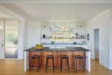 he new, much more open kitchen showcases Chromatic Abstraction, No. 5 by artist Danielle Dimston.