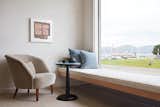 The custom floating window seat provides an excellent perch for watching the fog roll, enjoying a book, or sharing a cup of tea with a friend.
