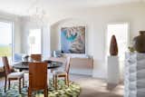 The combination of vintage, contemporary and custom furniture peacefully shares the space with the art, creating a dialogue with it but never overpowering it.