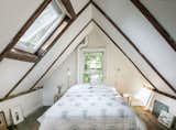 Powder room and sleeping loft, featuring the Hector Dome Wall Light from Original BTC
