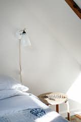 Powder room and sleeping loft, featuring the Hector Dome Wall Light from Original BTC
