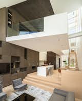 Generous volumes of open space allow day light from the third floor skylights to penetrate deep into the house, creating a bright, light-filled interior.